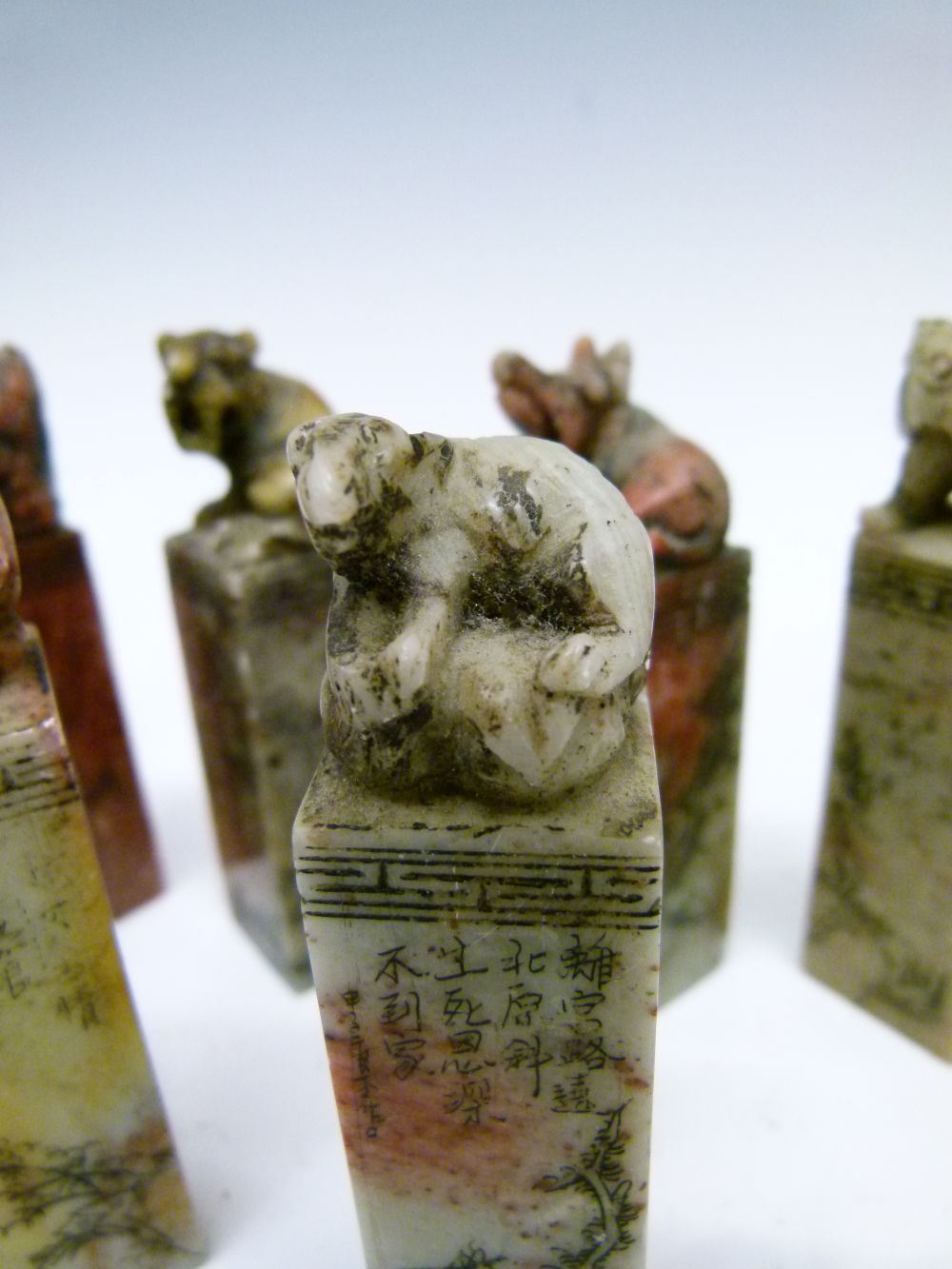 Set of twelve Chinese soapstone desk seals, each surmounted by a differing animal symbolising the - Image 7 of 14