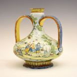 19th Century Continental faience or majolica vase of two-handled bulbous form, decorated with a