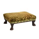 Regency carved beech footstool, possibly Irish, the later-upholstered rectangular seat over reeded