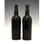 Wines & Spirits - Two bottles of Dow's 1960 Vintage Port (2) Condition: Some minor losses to the