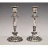 Pair of early 19th Century silver-plate on copper candlesticks, each having removable foliage-cast