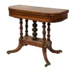 Regency brass-inlaid rosewood fold-over card table, the D-shaped top with line inlay enclosing green