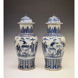 Large pair of 19th Century Chinese blue and white porcelain baluster jars and covers, each domed