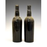 Wines & Spirits - Two bottles of Dow's 1960 Vintage Port (2) Condition: Some minor losses to the