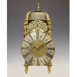Brass lantern-style clock, the 6.5-inch silvered Roman dial with inner quarter track and half-hour