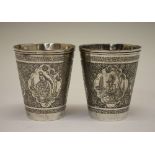 Pair of early 20th Century Persian (Isfahan, Iranian) white metal cups, each having engraved foliate