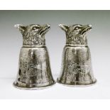 Pair of early 20th Century Hanau silver fox head stirrup cups, the bodies having engraved decoration