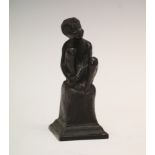 J.M. Riding (early 20th century) - Small cast patinated bronze figure of a seated boy, on square