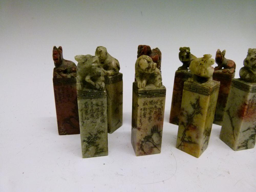 Set of twelve Chinese soapstone desk seals, each surmounted by a differing animal symbolising the - Image 2 of 14