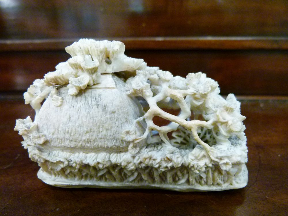 Japanese Meiji period carved ivory okimono, depicting figures outside a thatched mill cottage - Image 4 of 8