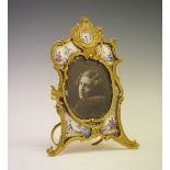 Early 20th Century Continental gilt metal and enamel photograph frame with timepiece having horse