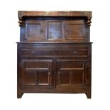 Part 17th Century oak press or court cupboard, of Westmorland type, the upper stage with planked