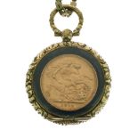 Gold Coin - George V sovereign, 1912, housed in a glass fronted gold coloured locket with base