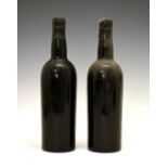 Wines & Spirits - Two bottles of Dow's 1960 Vintage Port (2) Condition: Some minor losses to the