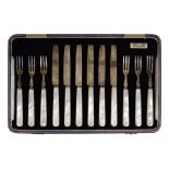 George V-George VI cased set of six silver and mother-of-pearl handled fruit knives and forks,