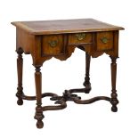 William & Mary-style walnut lowboy, the cross grain-moulded rectangular top with blind-tooled wine