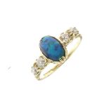 18ct gold, diamond and opal dress ring, the central cabochon (a black opal or doublet) approx 8mm