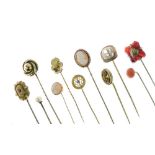 Group of eleven assorted yellow metal and unmarked stick pins, to include gem-set and cameo