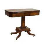 George IV brass-bound rosewood fold-over pedestal card table, the swivel top with brass line inlay