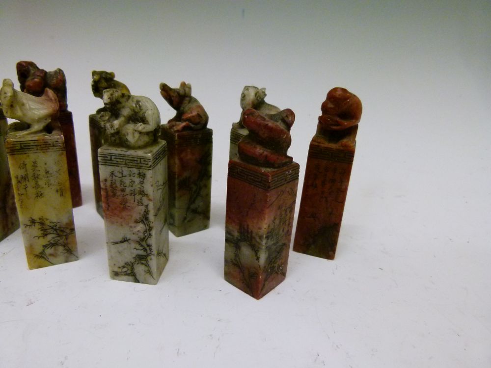 Set of twelve Chinese soapstone desk seals, each surmounted by a differing animal symbolising the - Image 3 of 14