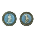 Two 19th Century Wedgwood blue jasperware plaques or roundels, each depicting a Classical muse, 27mm