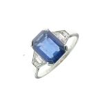 Mid 20th Century white metal, diamond and sapphire-coloured stone ring, the large central blue stone