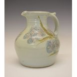 David Eeles (1933-2015) - Studio pottery jug, having floral decoration on a duck egg blue ground,