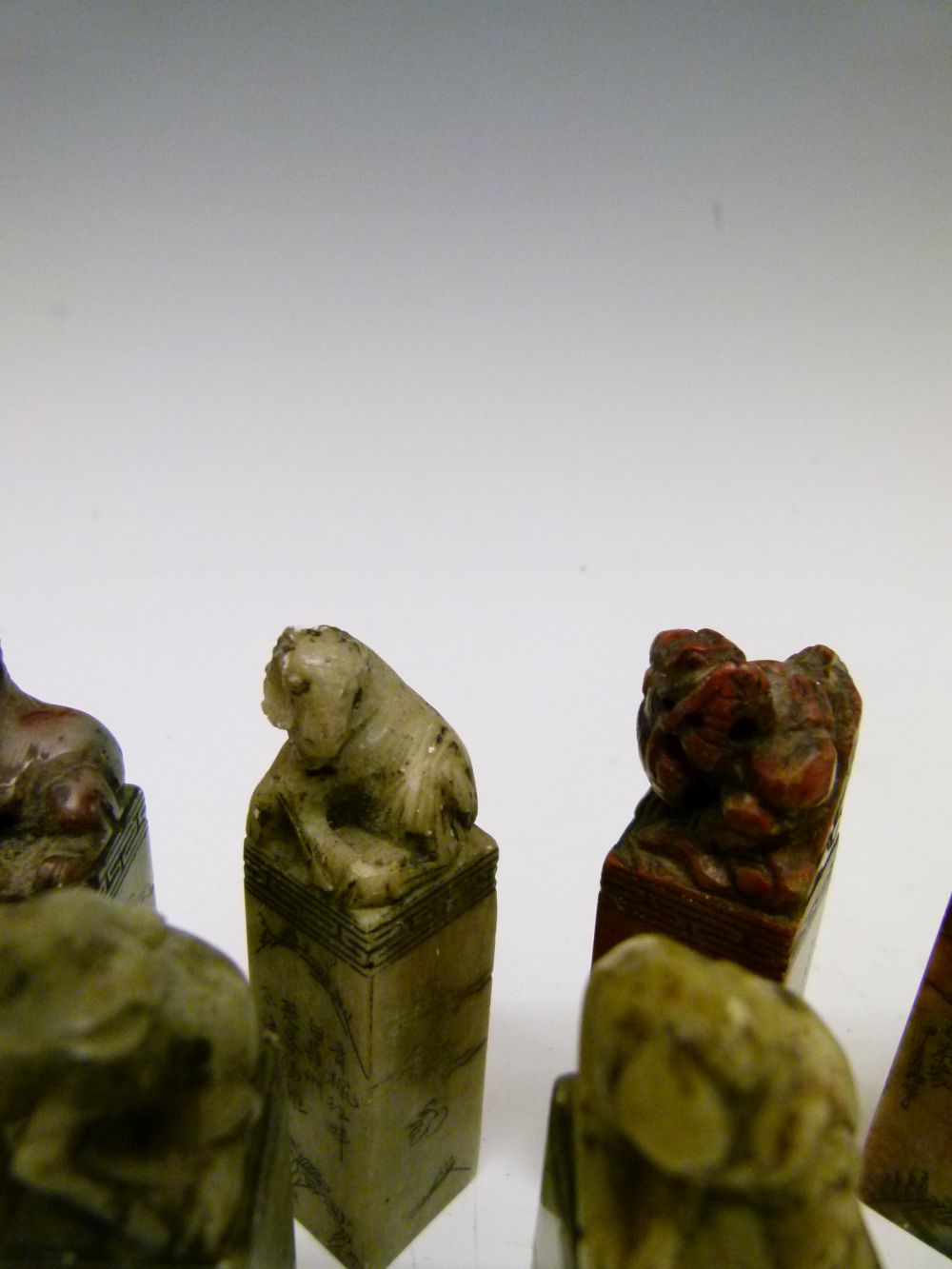 Set of twelve Chinese soapstone desk seals, each surmounted by a differing animal symbolising the - Image 14 of 14