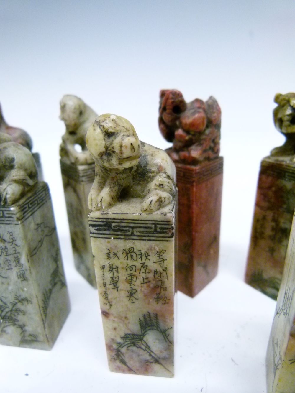 Set of twelve Chinese soapstone desk seals, each surmounted by a differing animal symbolising the - Image 11 of 14