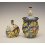 Rob Whelpton (1952) - Raku glazed pot, decorated with yellow spotted fish, the lid being a white