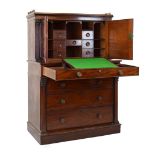 Mid 19th Century mahogany escritoire or writing cabinet, the superstructure with brass three-quarter