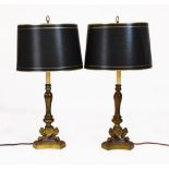 Pair of French Empire-style table lamps, each with balustroid stem on zoomorphic tripod support