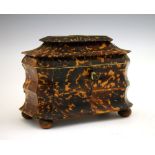 Early Victorian blonde tortoiseshell tea caddy, of bombé design, the hinged stepped cover of