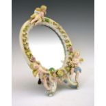 Late 19th/early 20th Century German porcelain dressing table mirror in the manner of Meissen,