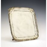 Elizabeth II silver salver, of square form with shaped and reeded edge, sponsors mark of Cooper