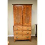 19th Century mahogany linen press, the pair of doors revealing brushing slides and drawered