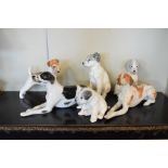 Six porcelain models of dogs, mostly Russian to include; Lomonosov, the pair of reclining pointers