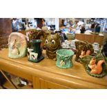 Group of Sylvac animals to include; Bulldog money box 5086, squirrel vases, etc, largest 15cm high