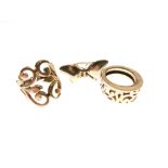 Two 9ct gold dress rings, one formed as a butterfly, size P, the other with foliate scroll work,