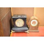 Early 20th Century inlaid oak mantel clock, 27cm high, together with an American ebonised mantel