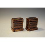 Pair of Victorian treacle glazed pottery money boxes formed as chests of drawers, 8.5cm high