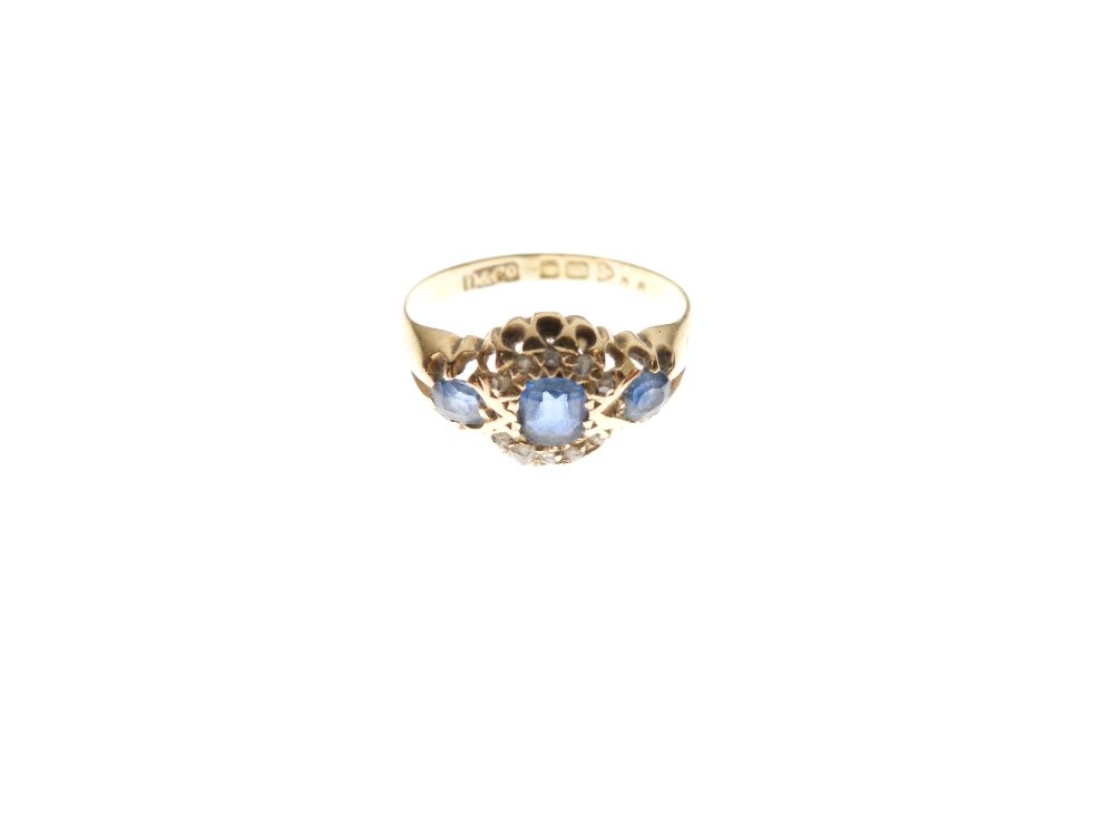 18ct gold and three-stone sapphire dress ring, size L½, 2.5g gross approx