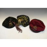 Two sporting caps dated 1920/21 having G.D monogram beneath crown, and one other embroidered