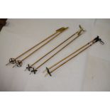 Three pairs of bamboo ski poles