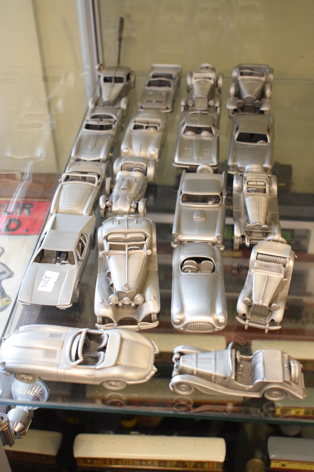 Quantity of Danbury Mint pewter model vehicles to include; MG-TD 1951, Ferrari 212 Barchetta 1952,