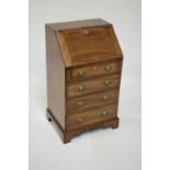 Reproduction mahogany bureau of narrow proportions, 52cm wide