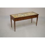 Tile-top pine table, decorated with twelve Zodiac tiles over three drawers, 107cm x 42cm x 52cm high