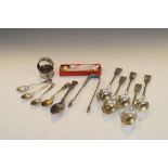 Assorted silver to include; dessert spoons, teaspoons, souvenir spoons, napkin rings, sugar tongs,