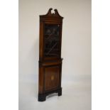 Early 20th Century mahogany and satinwood crossbanded floor standing corner cabinet, 199cm high