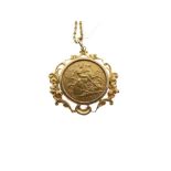 Gold Coin - Edward VII Half Sovereign 1909, in foliate scroll frame as pendant, together with a